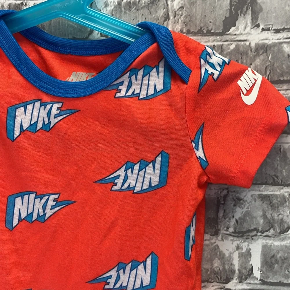 Nike baby onesie in orange  and‎ Blue